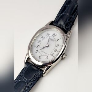 Vagary by Citizen Solar-Tech Oval Solar Watch – E031-K004063 CK / GN-0-S 9